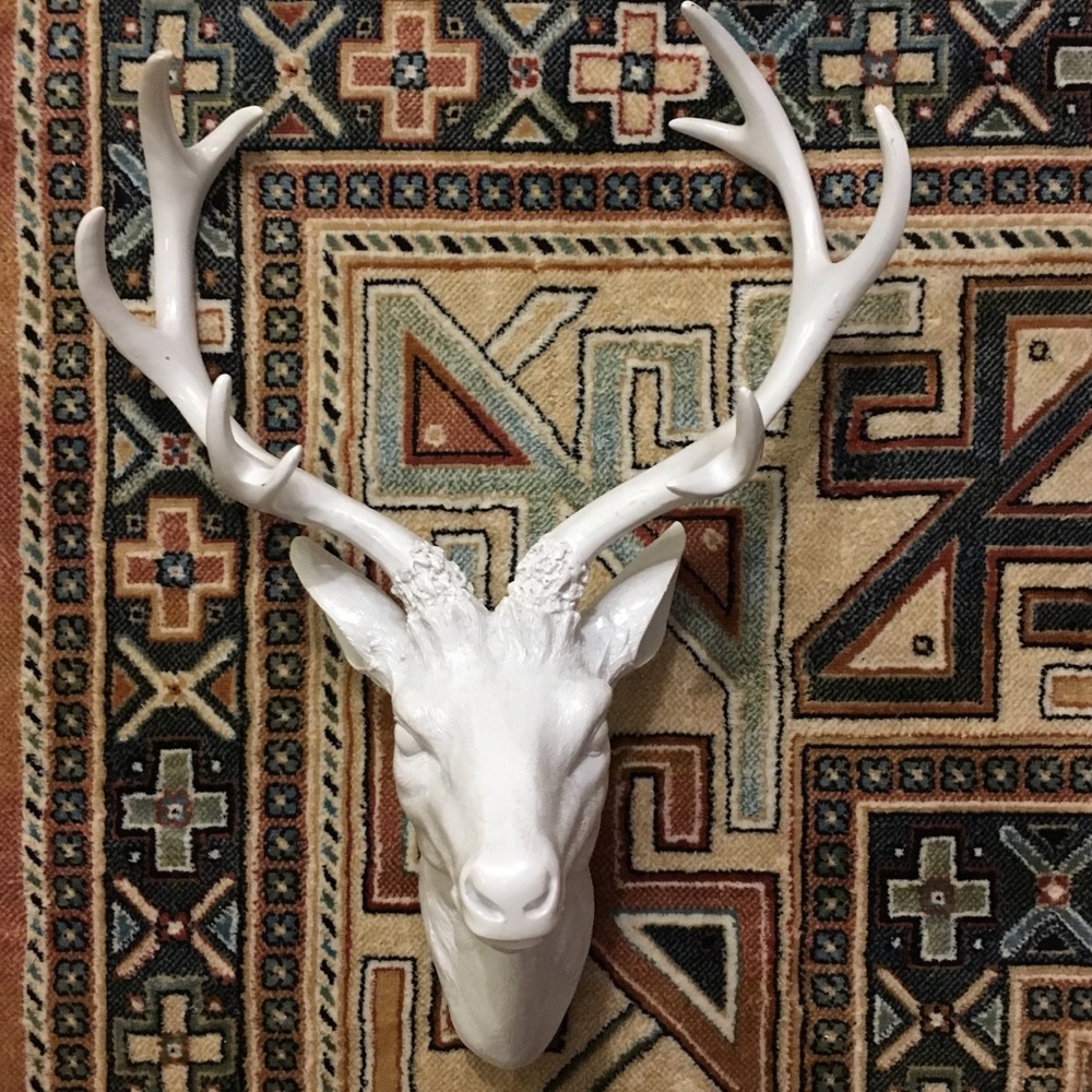 White faux deer head
